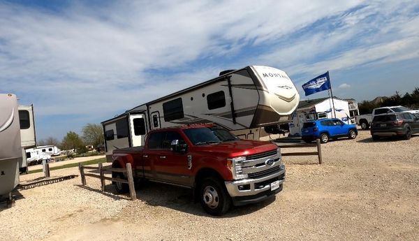 Truck with RV in site at Lakeland RV Ranch