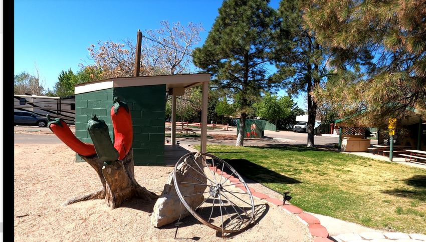 Cactus and wagon wheel sculptures at the KOA campground